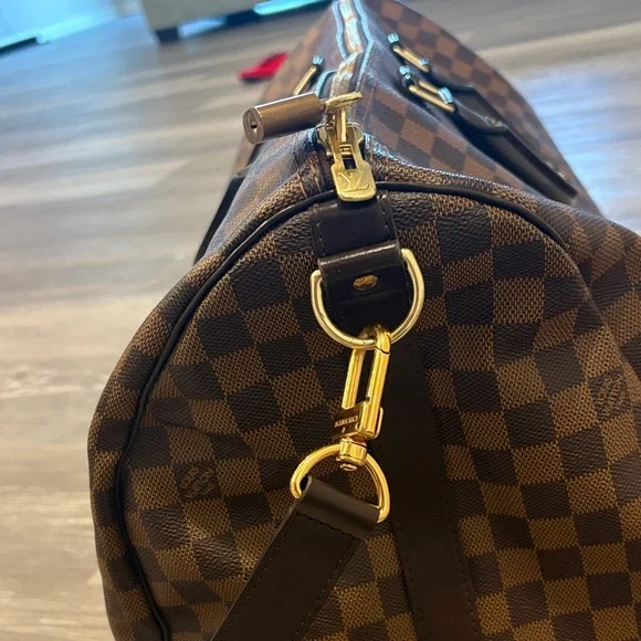 Authentic Louis Vuitton Keepall Bandoulière 55 - Picture 4 of 17